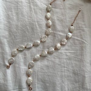 Two pearl anklets